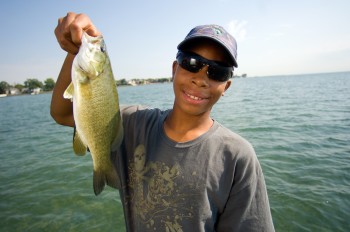 NRC Youth Conservation Council Boy+holding+fish