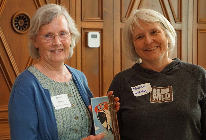 Charity Steere (left) receiving Gartland Award.