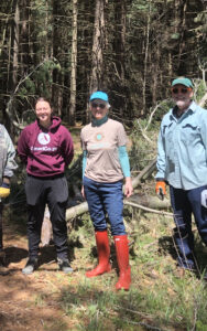 Volunteer Jo Mayer (center) at a Beckwith Preserve workday