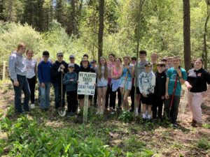 Stockbridge student volunteers plant trees at Beckwith Preserve