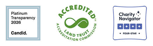 Badges for PLatinum Transparency 2026, Candid; Accredited Land Trust Accreditation Commission; and Charity Navigator Four Star